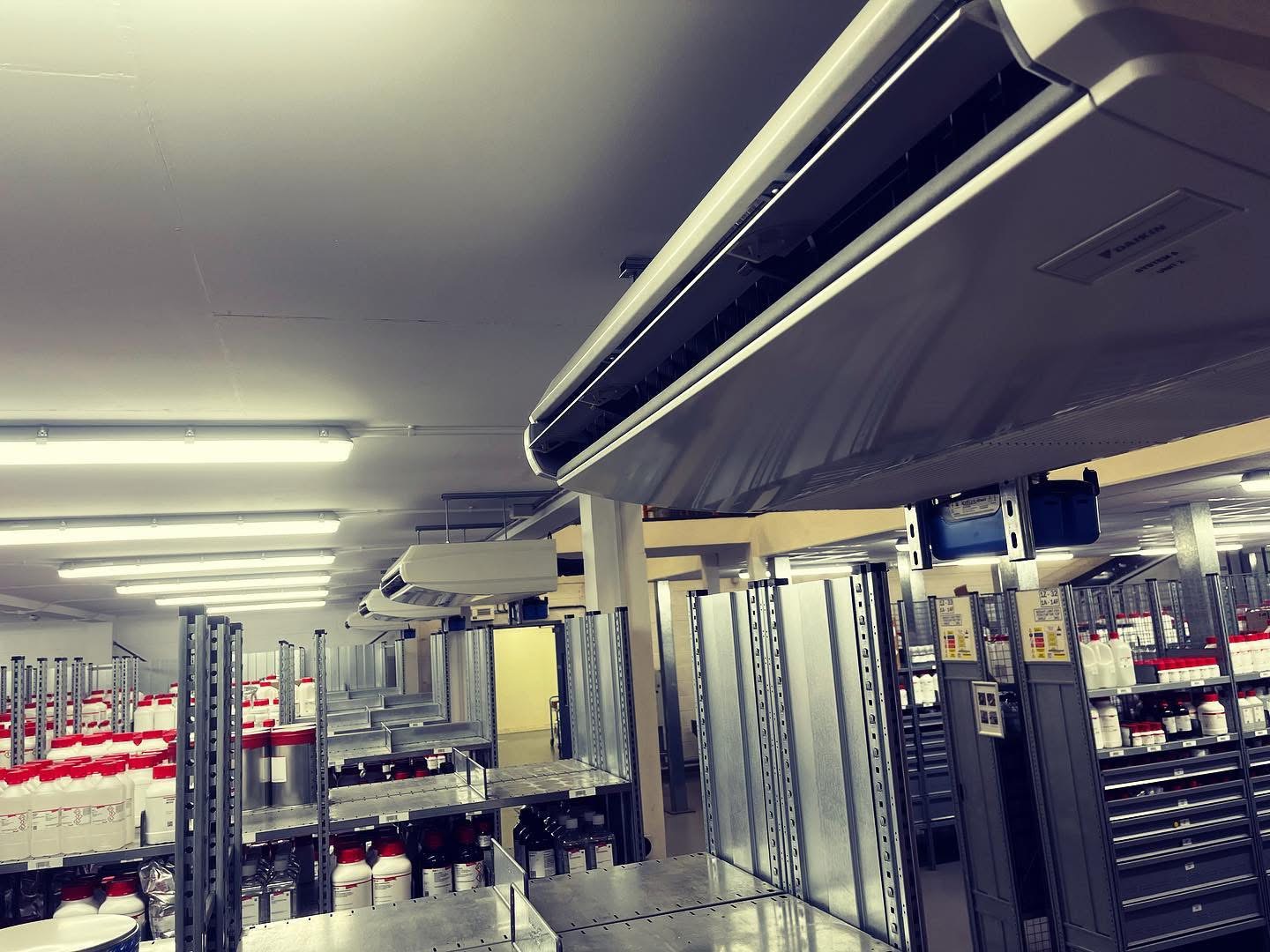 Run of Daikin cassettes across the warehouse floor